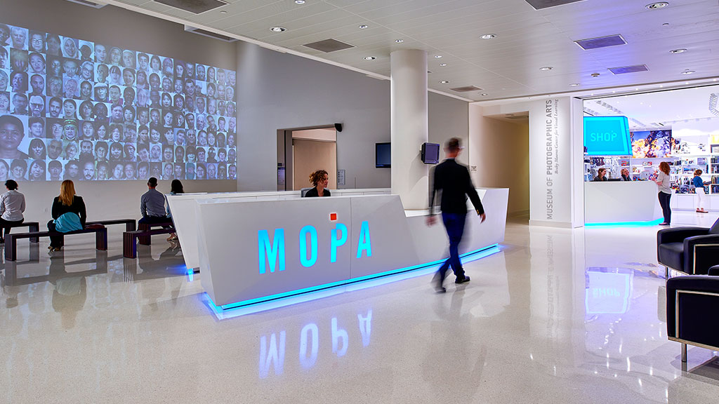 A person walking in a large room.