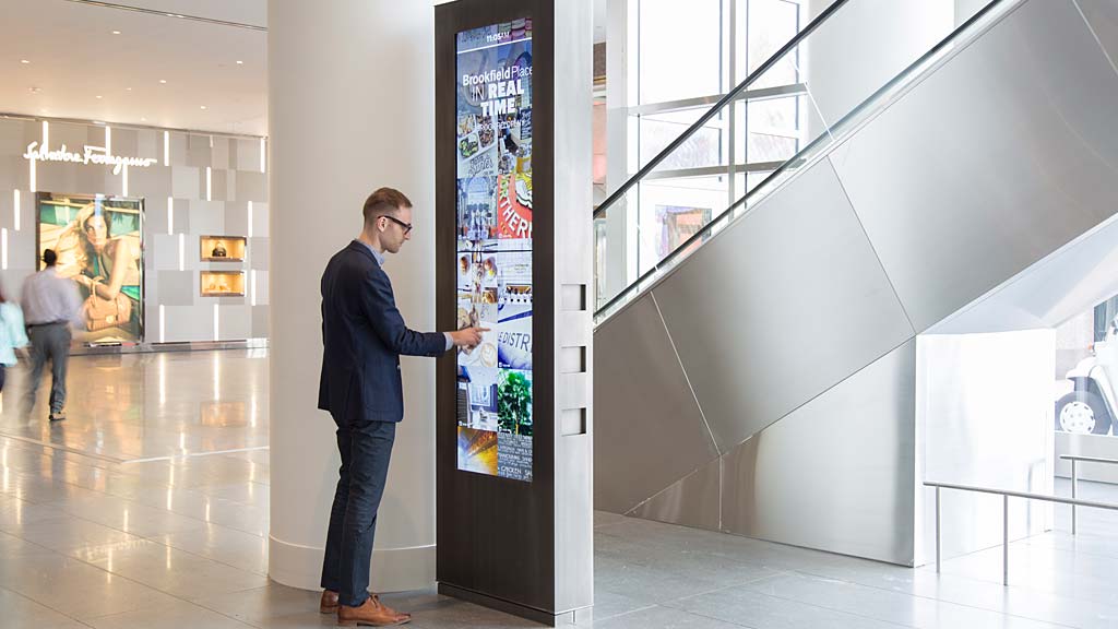 A person standing in a hallway.