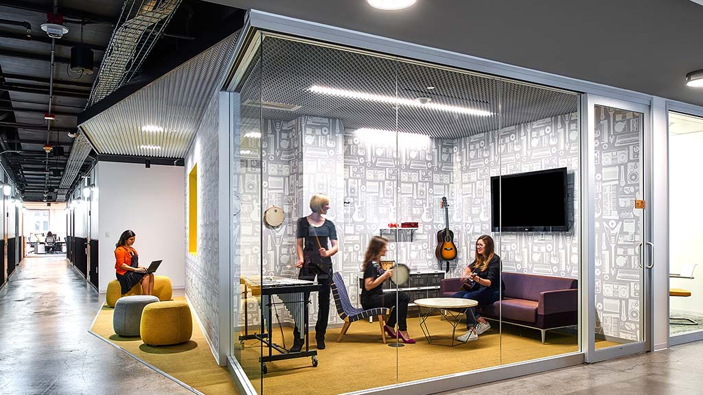 A group of people in a room.