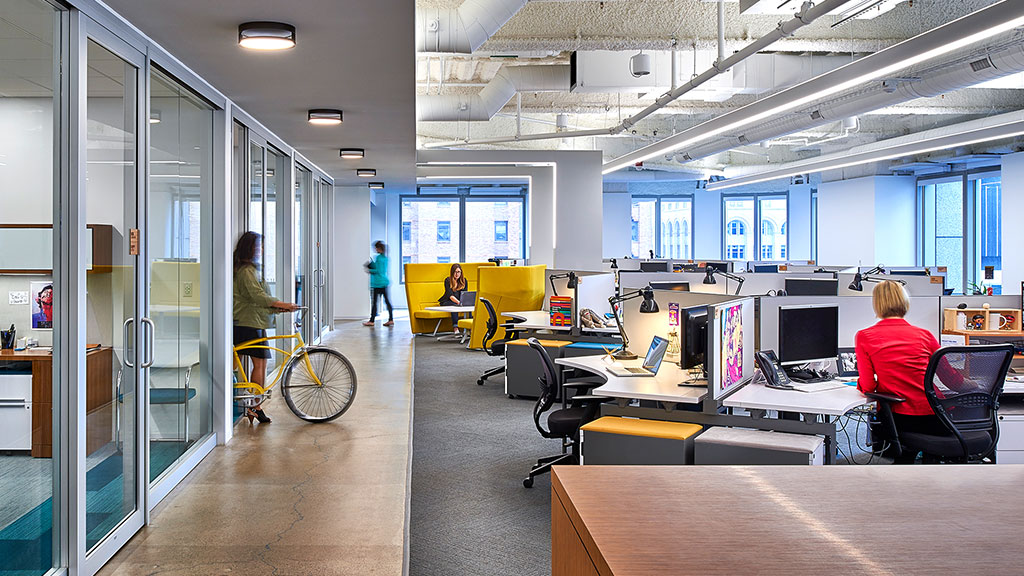 A few people in an office.