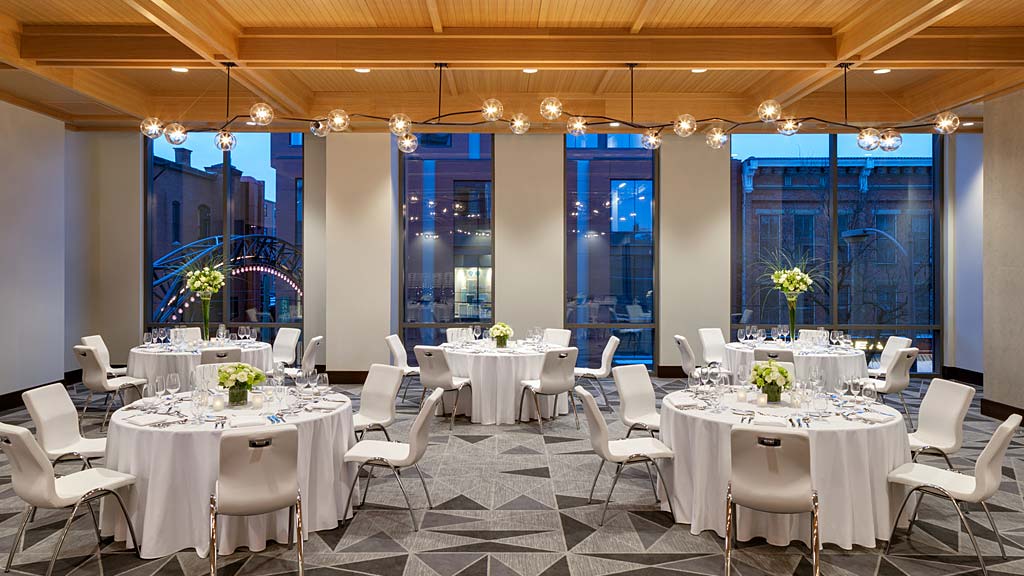A room with tables and chairs.