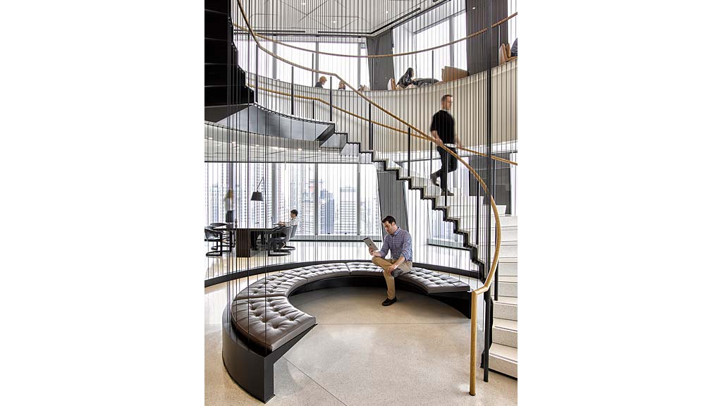 A person sitting on a staircase.