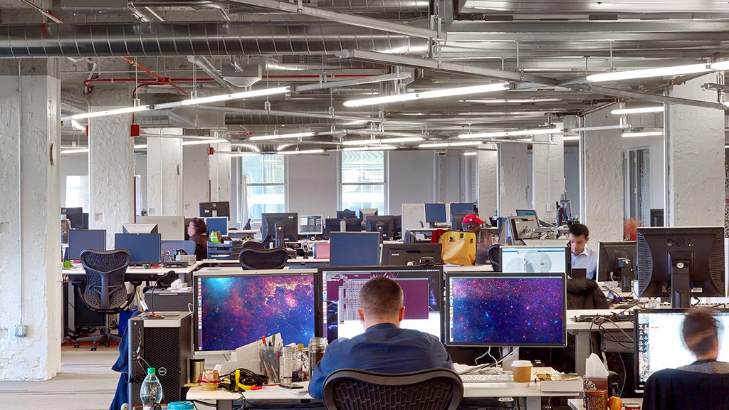 A group of people working in an office.