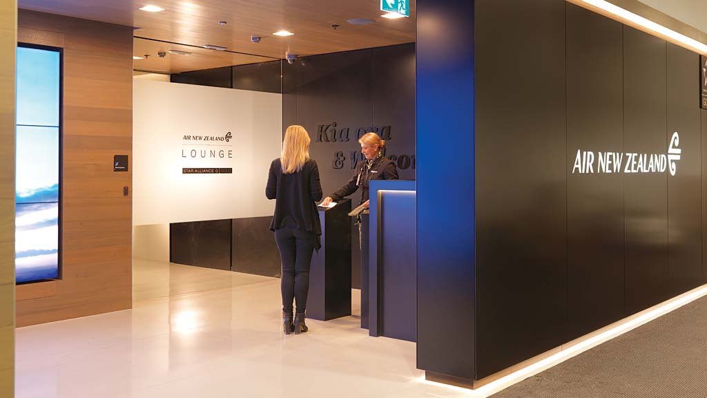 A person standing next to a podium.