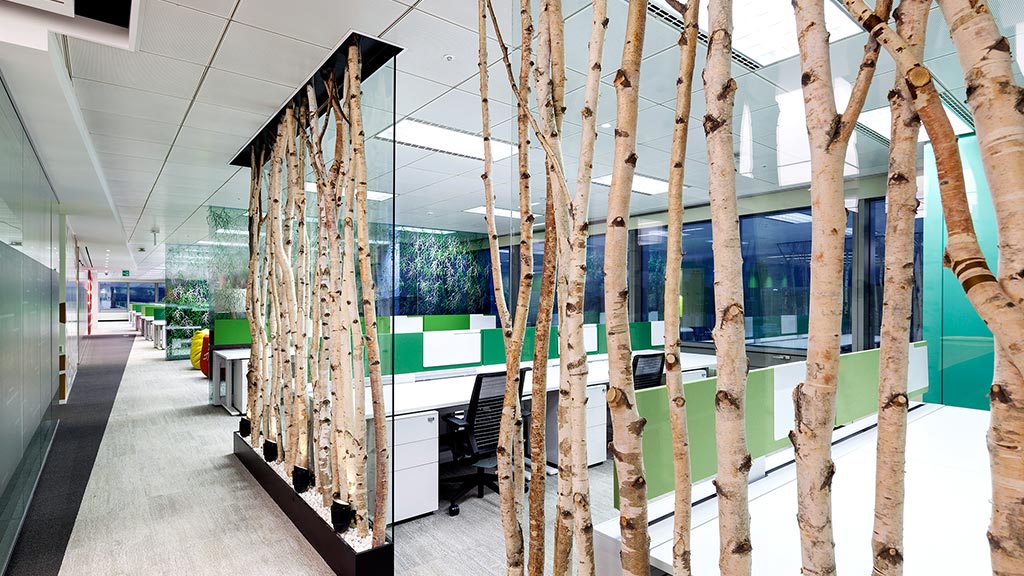 A room with many wooden poles.