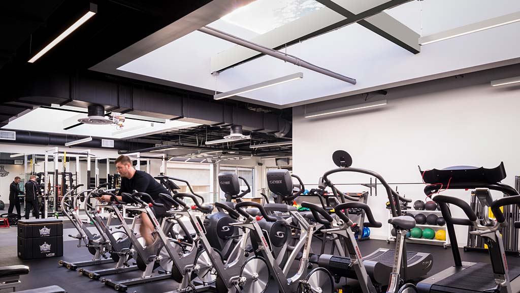 A person working on a machine.