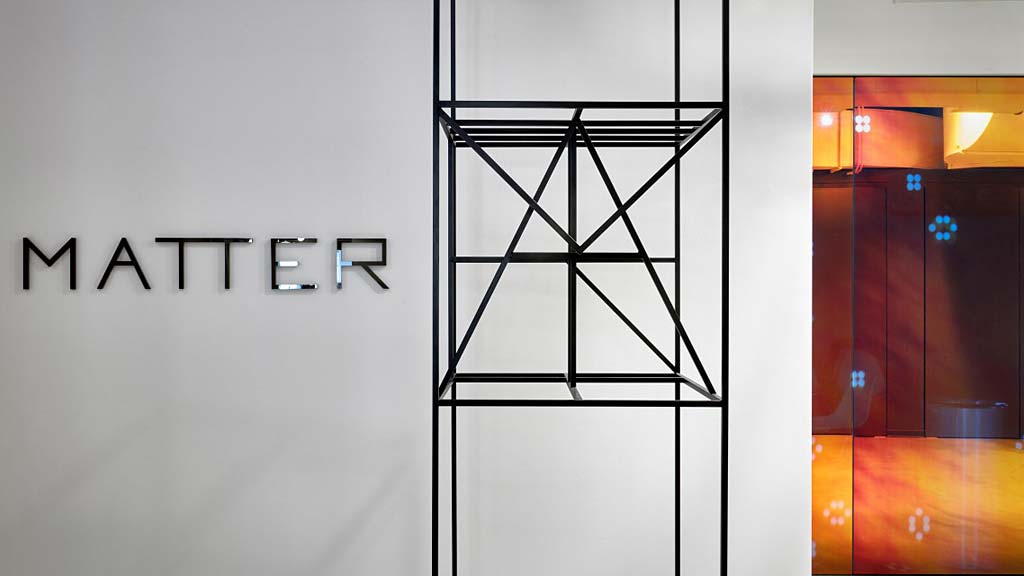 A white wall with black text.