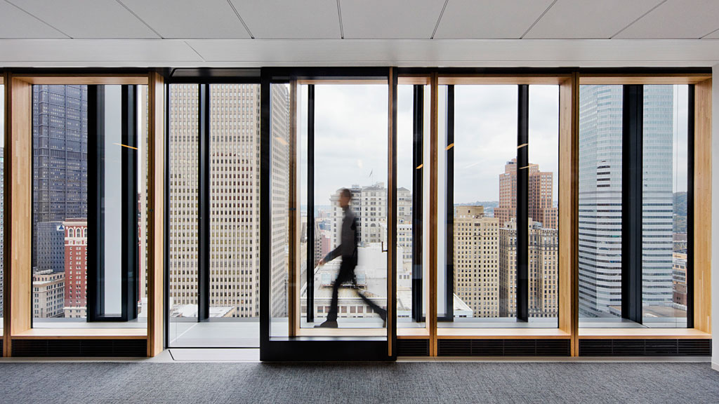 A person walking through a building.