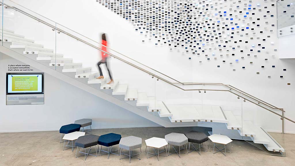 A person standing on a ladder.