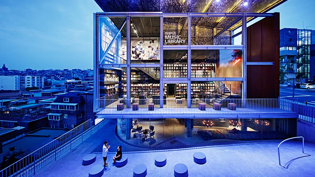 A building with a glass front.