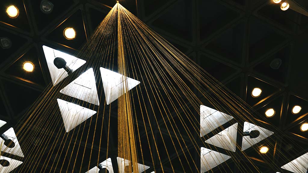 A large sailboat with sails.