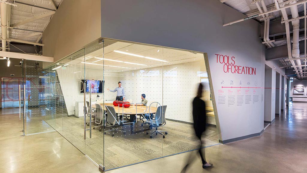 A person walking in a large room.