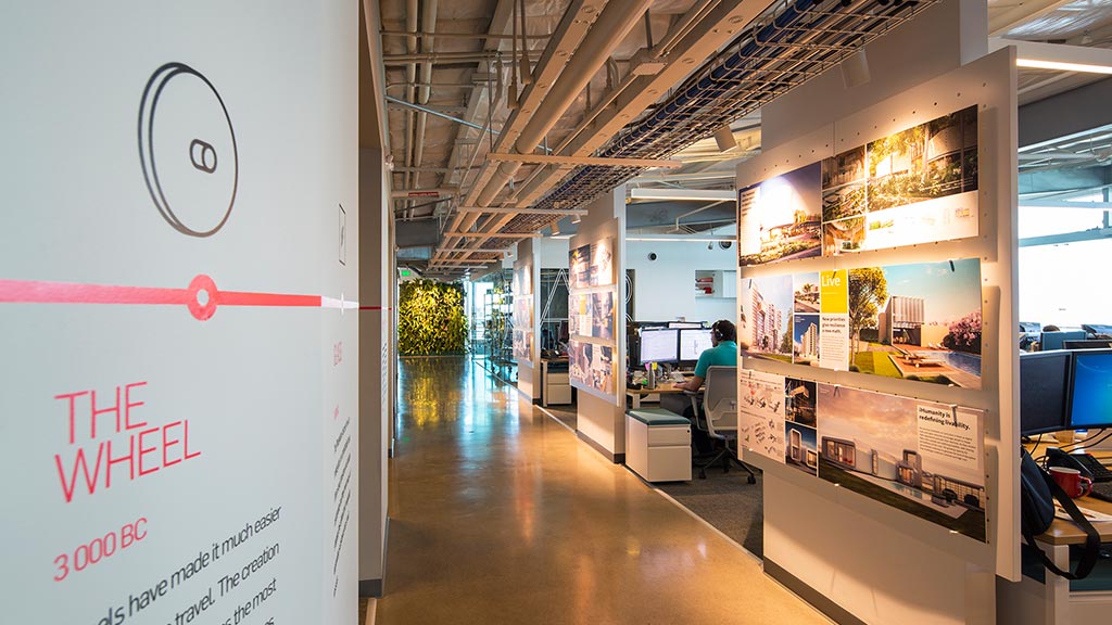 A person sitting at a desk in a store.