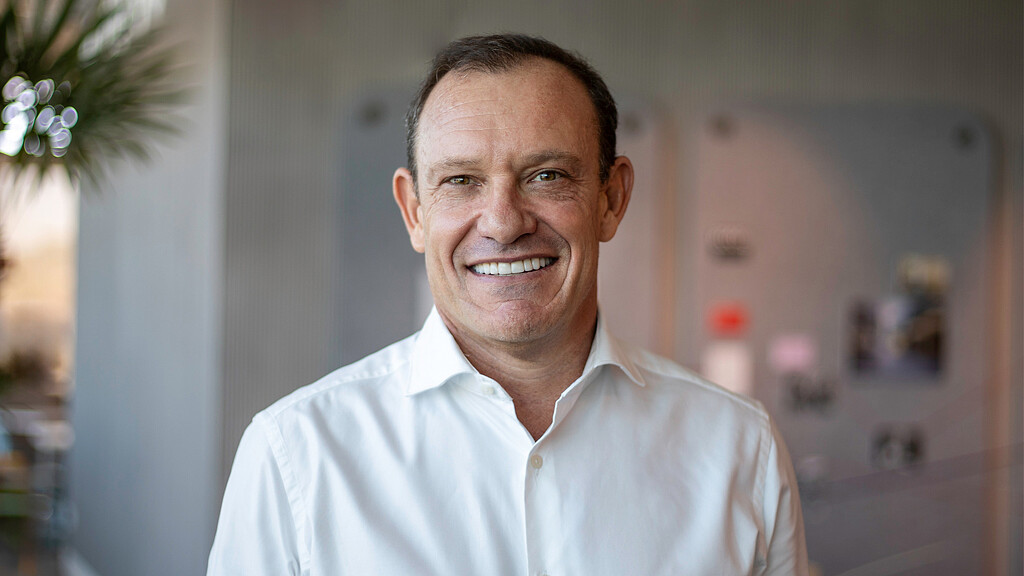 A man smiling for the camera.