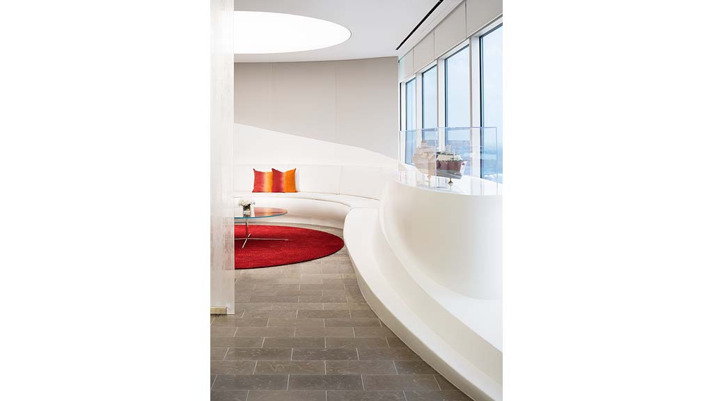 A bathroom with a tub and a sink.