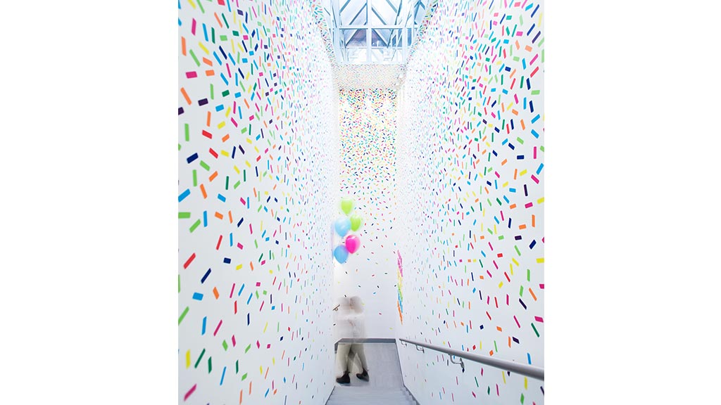 A dog looking out a window.