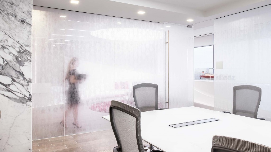 A room with a table and chairs.