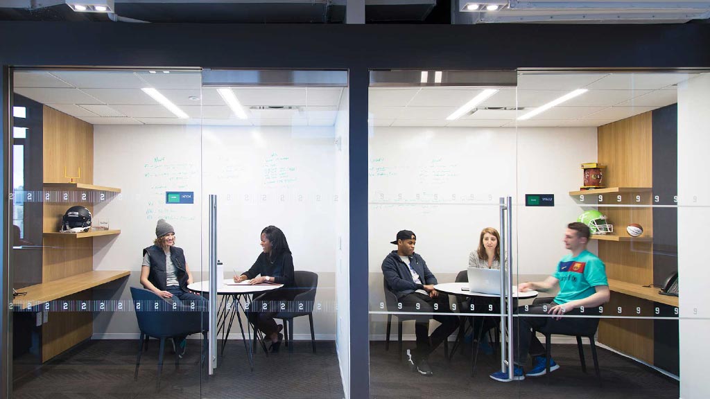 A group of people sitting at a table.