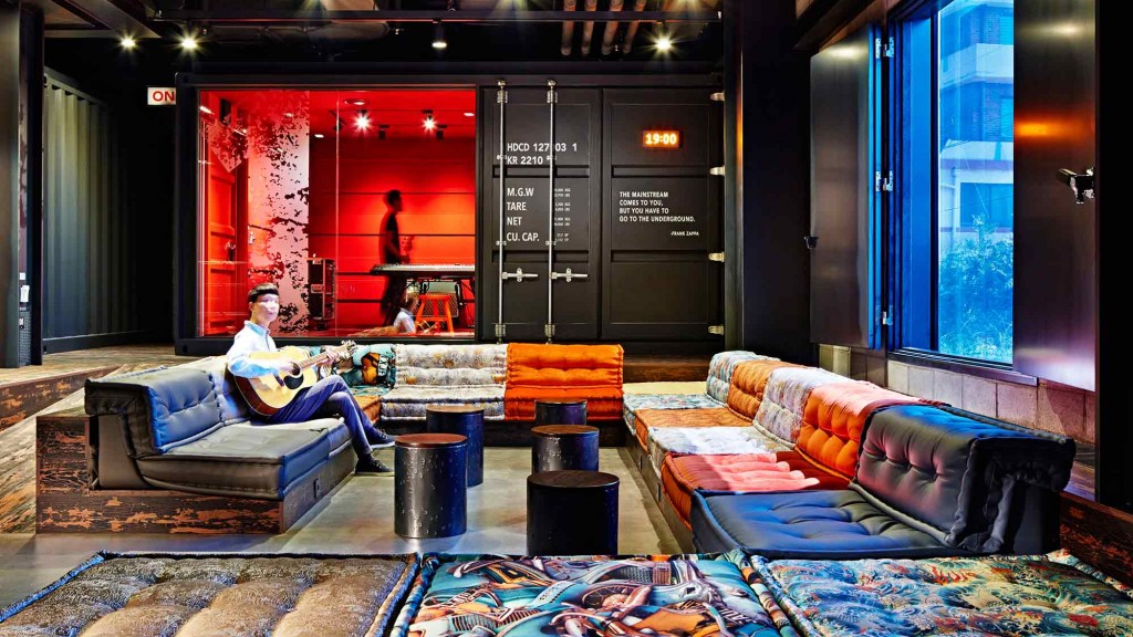 A person sitting on a couch.