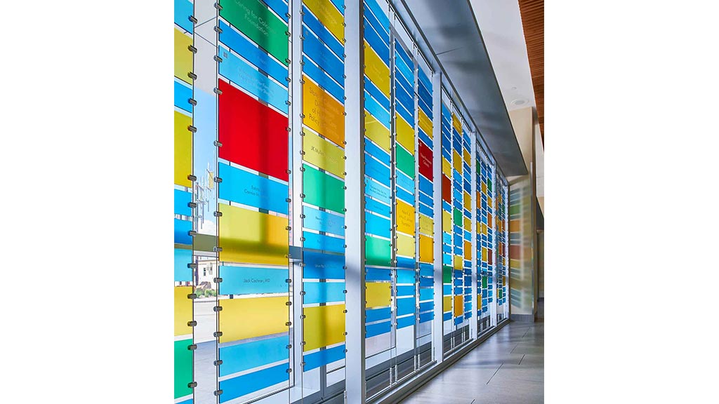 A wall of colorful containers.