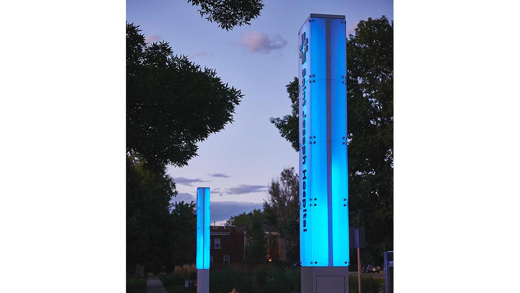 A blue and white sign.