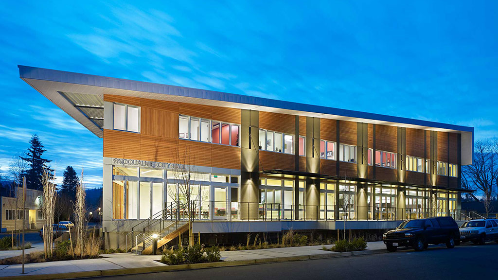 A building with a parking lot.