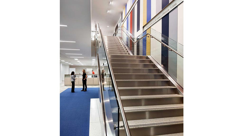 People walking up a flight of stairs.