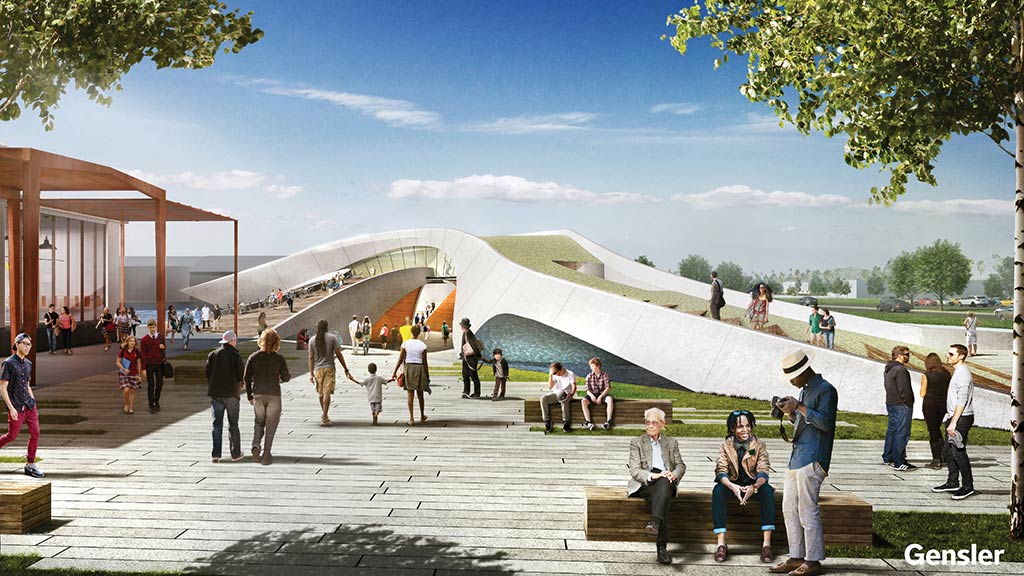 A group of people walking around a skate park.