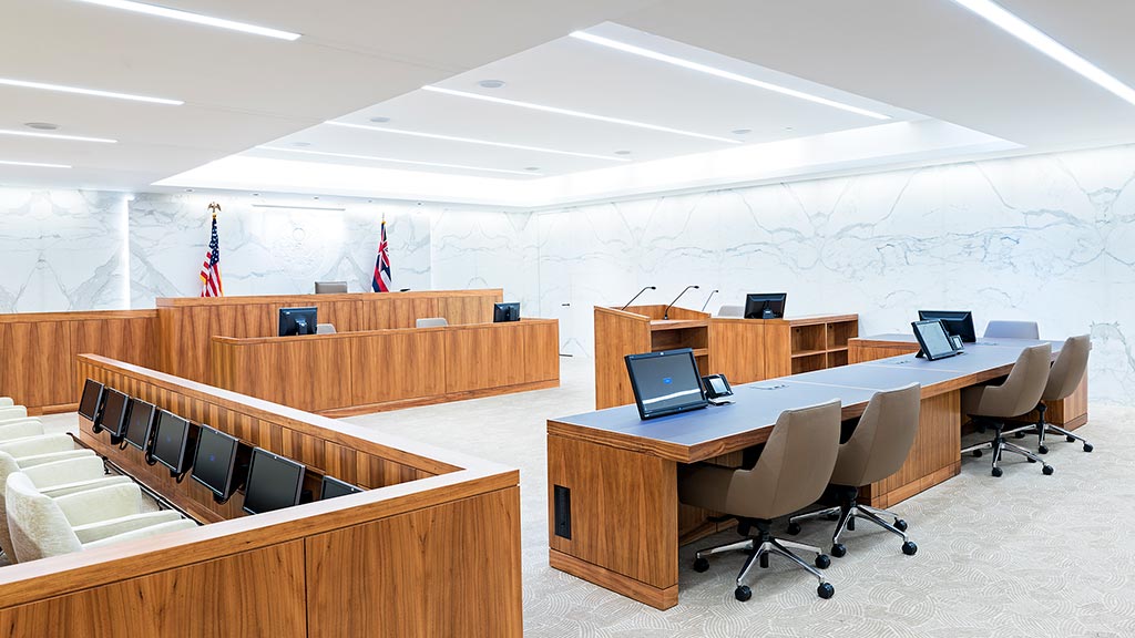 An empty conference room with a laptop.