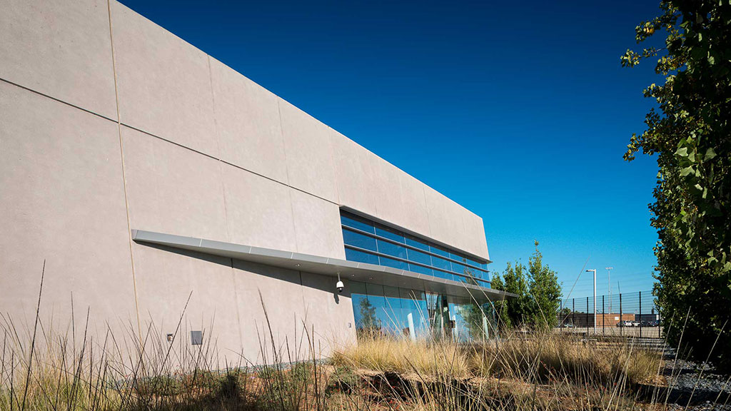 A building with a glass wall.