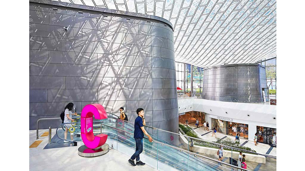 A person skating on a ramp.