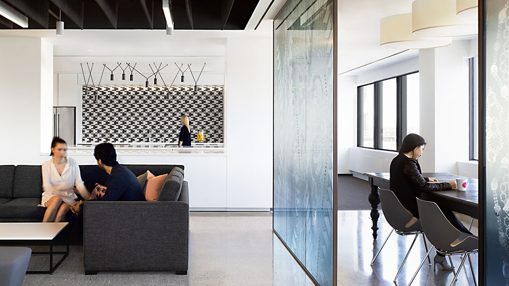 A group of people sitting in a room.