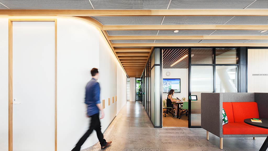 A person walking in a room.