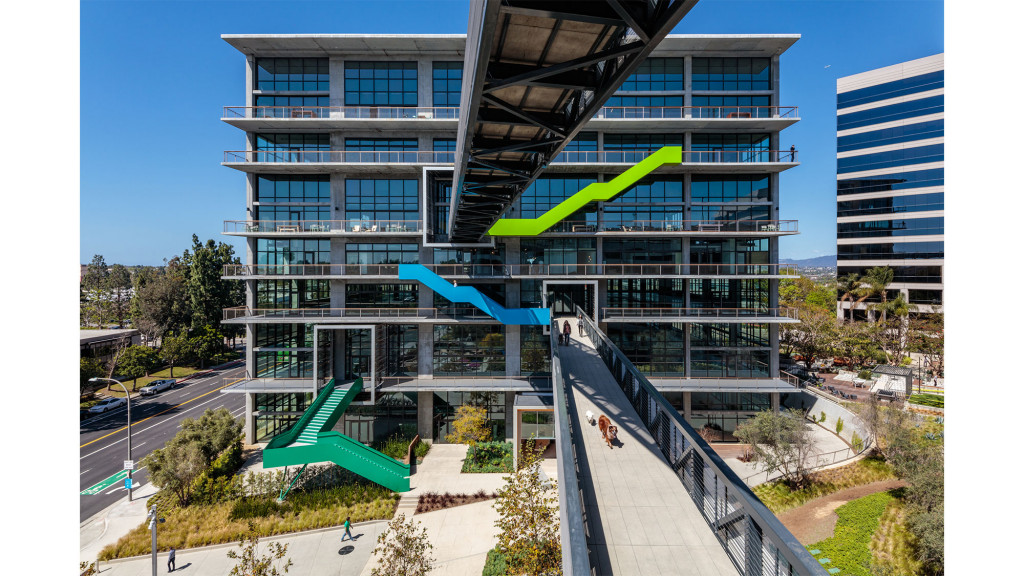 A building with a green slide.