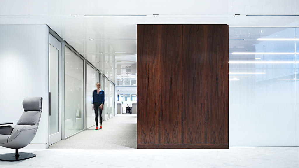 A person walking in a room.