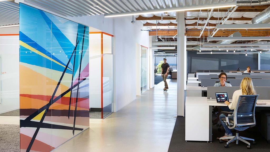 A man and woman in an office.