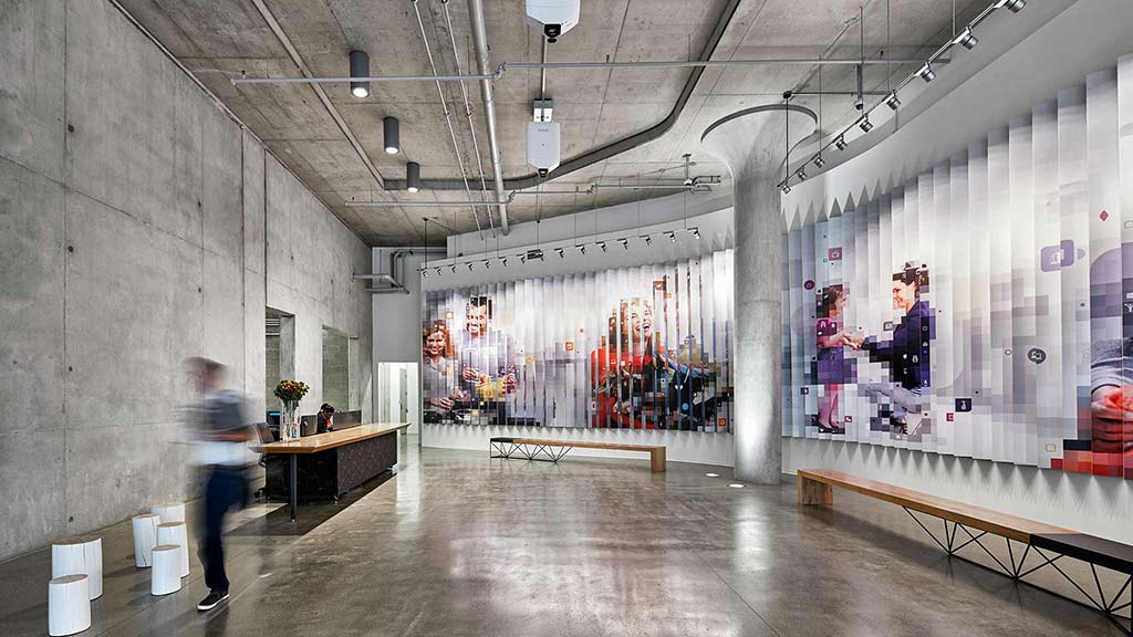 A person walking in a large room.