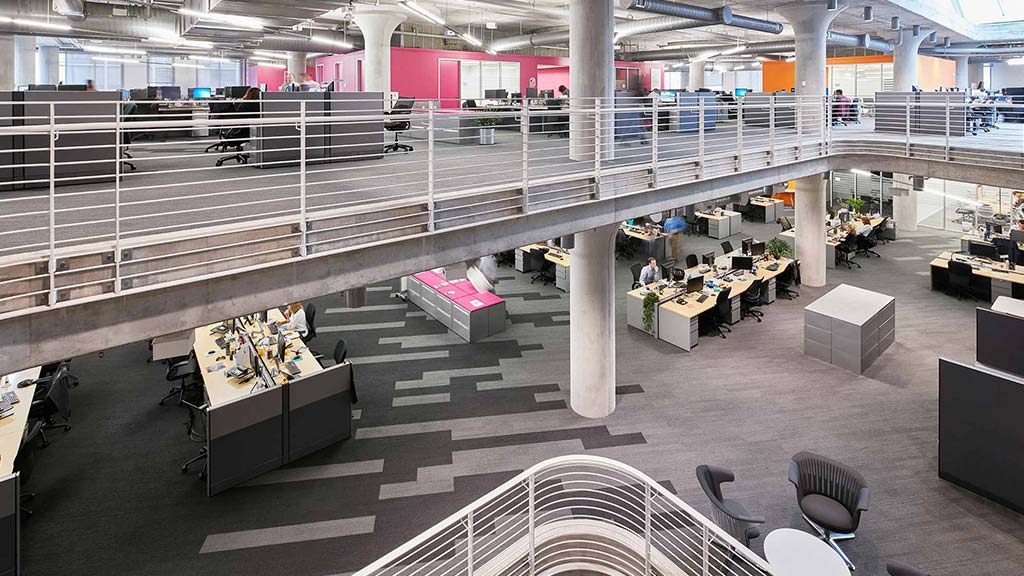 A large room with tables and chairs.