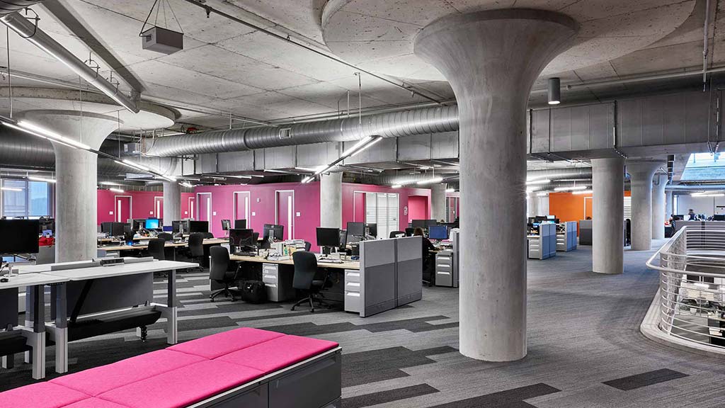 A large room with tables and chairs.