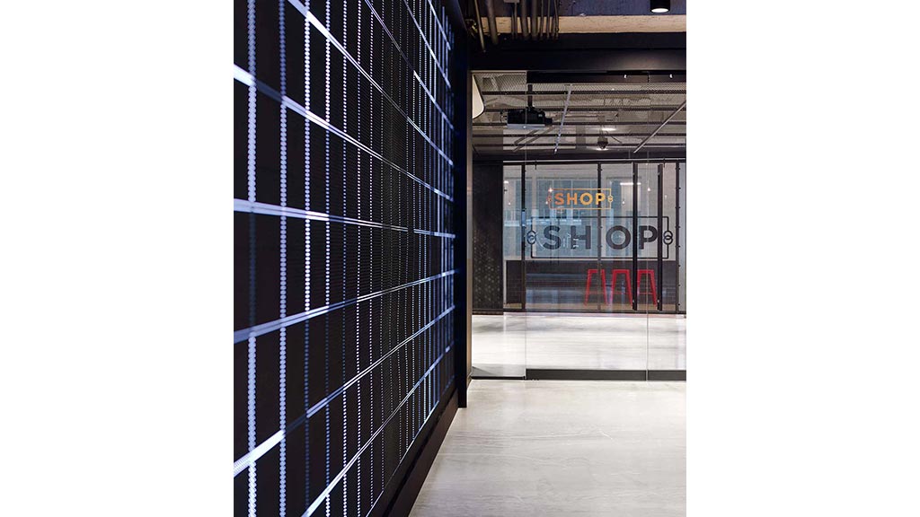 A room with a metal gate.