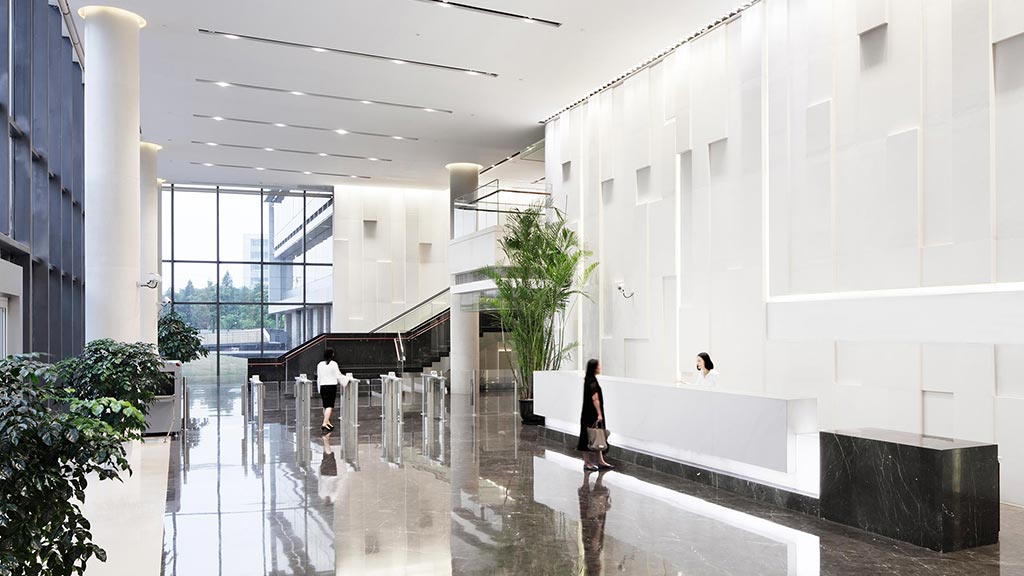 A person walking in a large building.