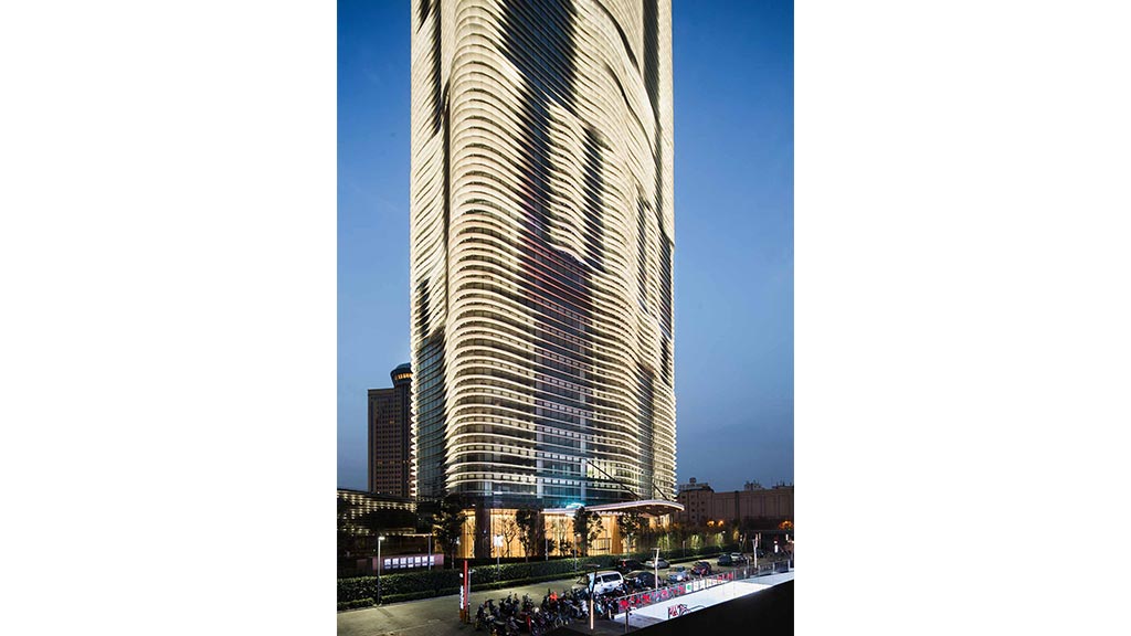 A tall building with many windows.