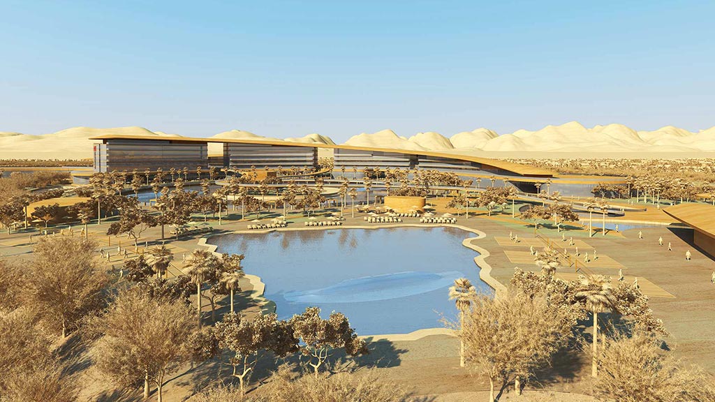 A large building with a pool in front of it.