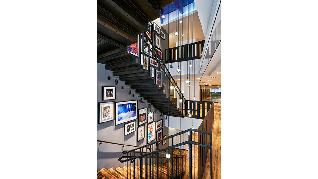 A staircase with signs and lights.