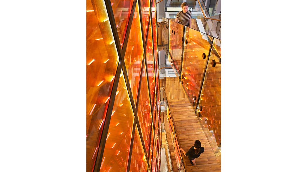 People walking down a flight of stairs.