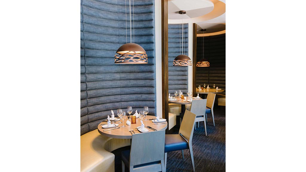 A room with tables and chairs.