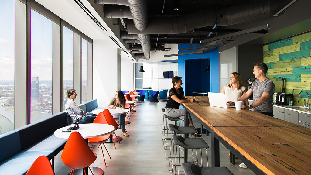 A group of people sitting at a table.
