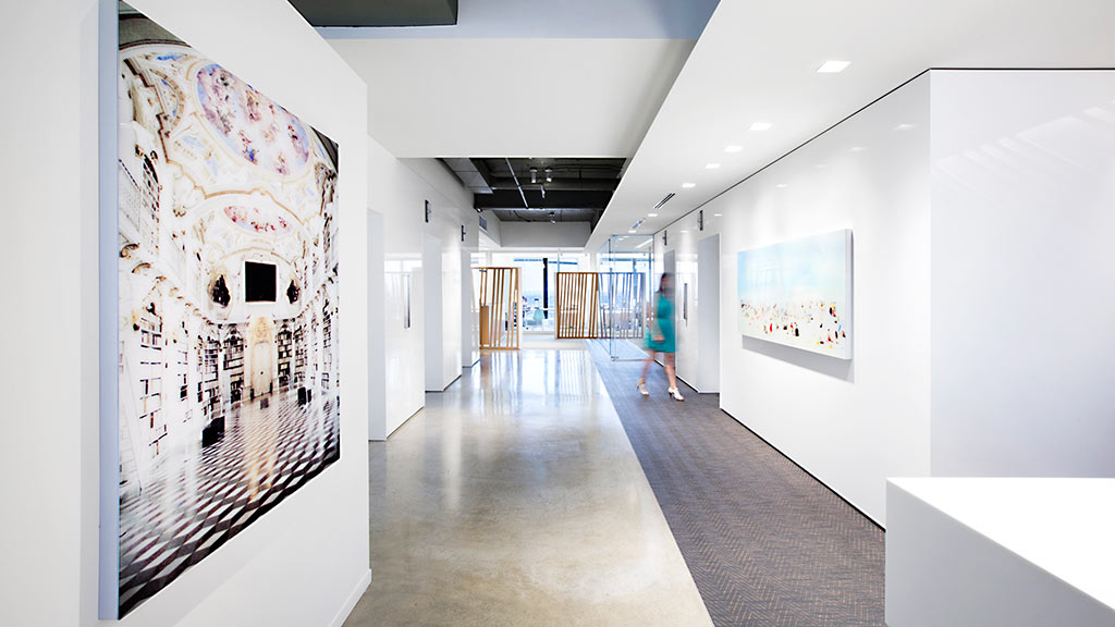 A person walking in a hallway.