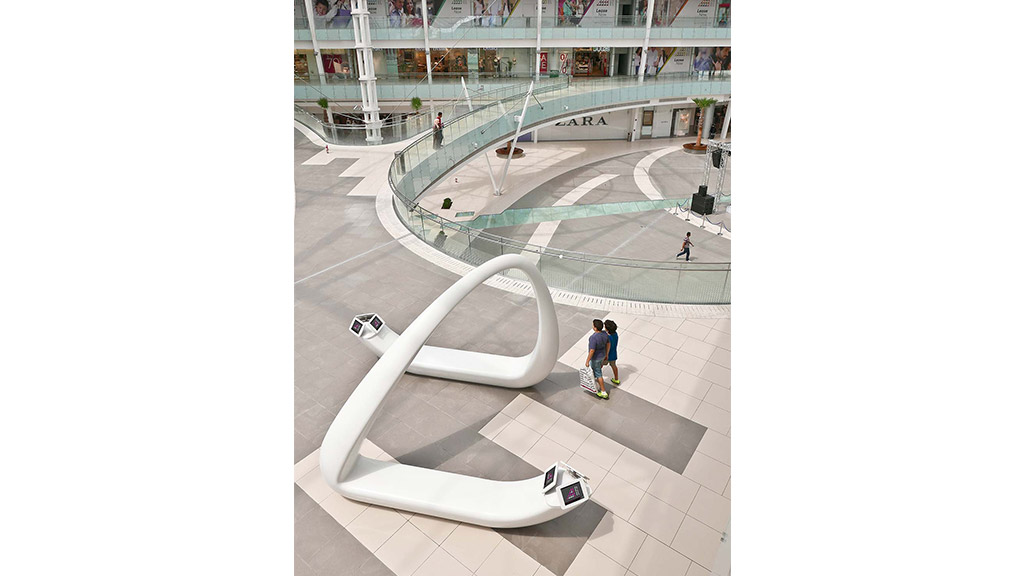 A large indoor mall with people.