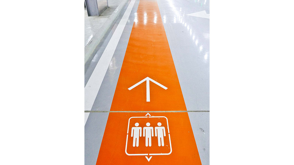 An orange and white sign.